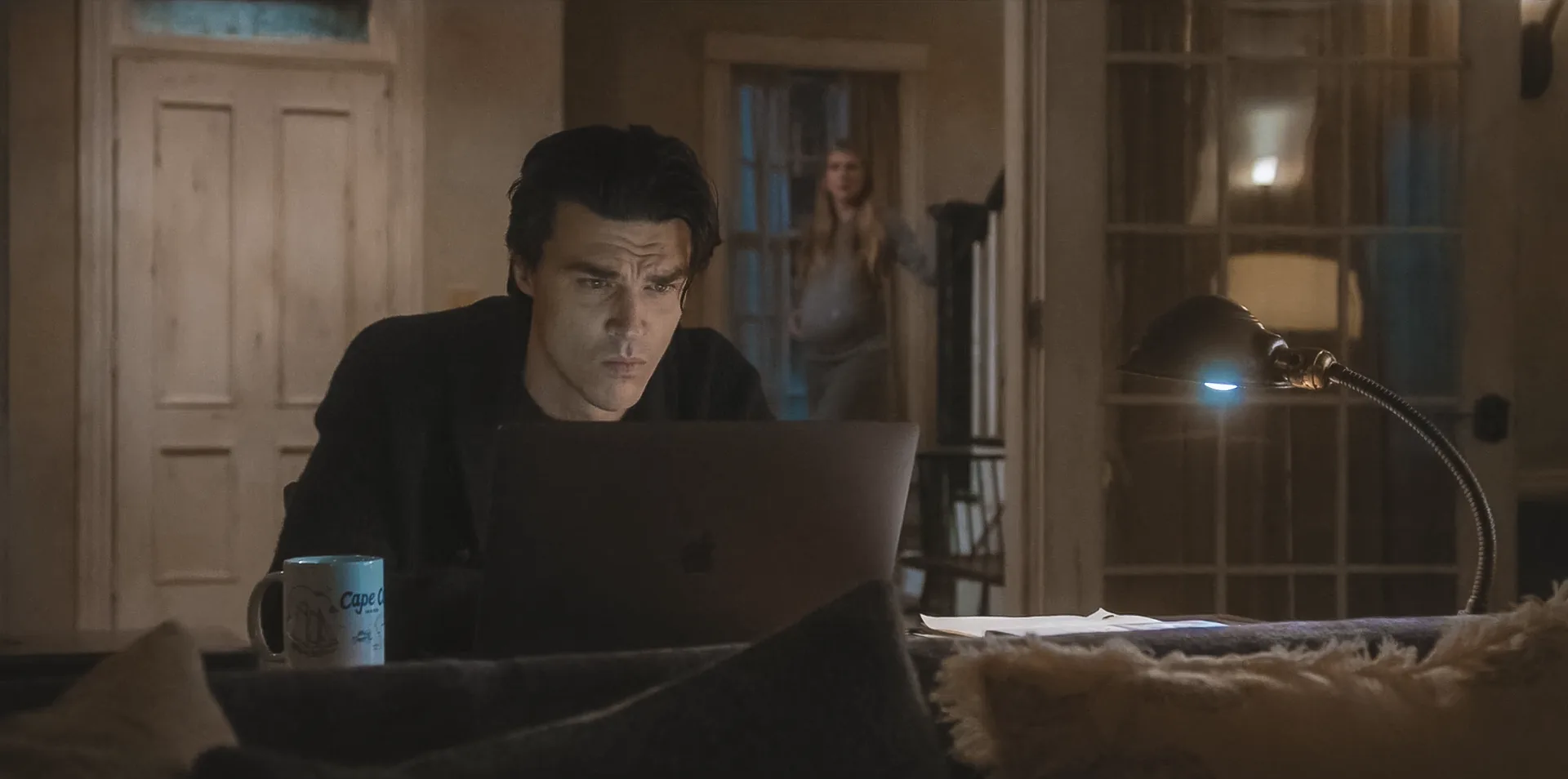 AHS: Double Feature: Harry typing furiously on his computer after getting a good shot of inspiration
